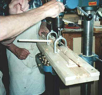 Craftsman using Horse Shoe Clamps